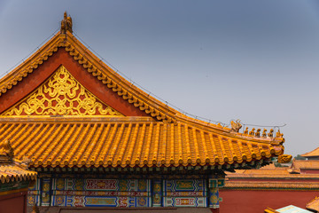 Obraz premium Buildings with colorful paintings in Forbidden City landmark, Beijing, China on a summer day