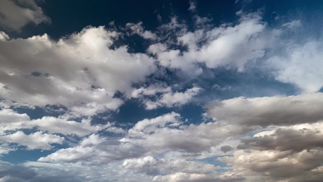 White clouds and blue sky time lapse. Utah, USA. UHD, 4K