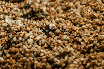 Buckwheat porridge with mushrooms. Selective focus.