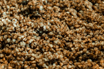 Buckwheat porridge with mushrooms. Selective focus.