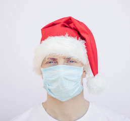 man wearing santa hat. Man mask. COVID-19. Christmas man