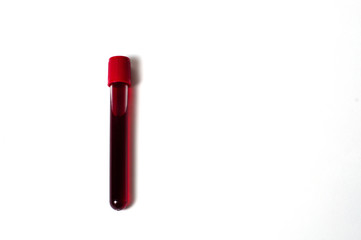 Test tube with blood isolate on a white background