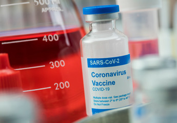 Coronavirus covid-19 experimental vaccine in a laboratory, conceptual image