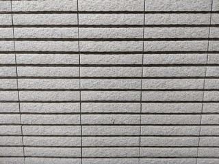 white or grey brick wall