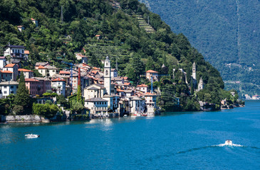 panoramic viewpoint over Como lake and an ancient fishing village.Italy