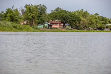 old wood house on water