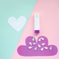 Step by step children's cardboard crafts for mothers day- pink flower on a purple heart shaped sheet. Scissors, glue, paper sheets. Children activity in kindergarten, school, at home. Step 4