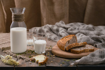 Meal with milk and bread in the country on World Milk Day. Horizontal shot.