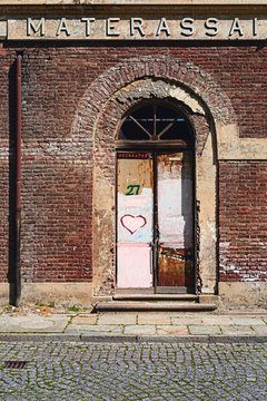 Old abandoned butchery in historic public in Collegno Italy