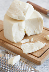 South Italian cheese cacioricotta with a grater