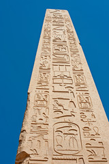 Obelisk with hieroglyphics and ancient egyptian Karnak Temple