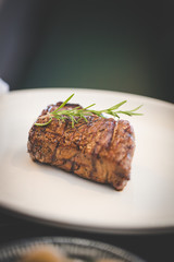 Close up image of a juicy steak in a gourmet restaurant