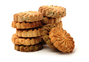 Cookies made of whole grain cereals on a white background