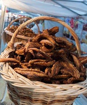 Jumari, delicious unhealthy fried pork greaves in a basket for sale during street food festival