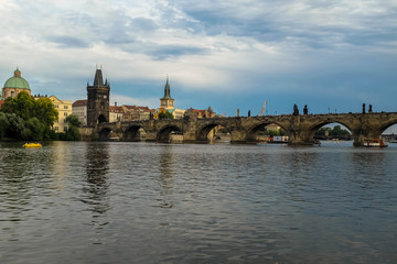 Charles bridge over the Vltava river in Prague. Czech Republic. Tourism in Europe.