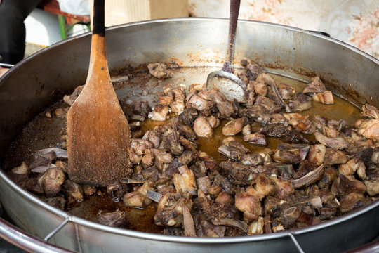 Jumari, delicious unhealthy fried pork greaves in a basket for sale during street food festival