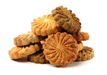Cookies made of whole grain cereals on a white background