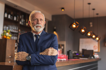 Senior businessman in restaurant