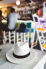 Hat on the restaurant table in Ibiza, Spain