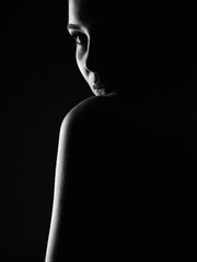 Beautiful Woman silhouette in the dark