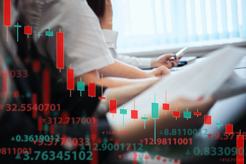 A group of people analyze the stock market. Business and finance, technology, cryptocurrency, stock...