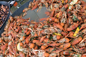 Close up image of freshly boiled crayfish on outdoor outside cooking wok