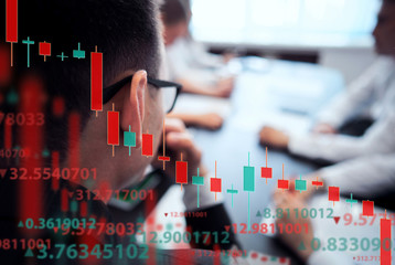 A group of people analyze the stock market. Business and finance, technology, cryptocurrency, stock...