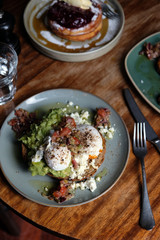 Delicious vegetarian breakfast with avocado and egg toast