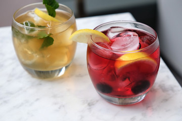 Refreshing summer cocktails with berries and mint