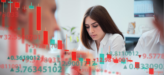 A group of people analyze the stock market. Business and finance, technology, cryptocurrency, stock...