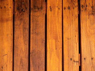 Background of wooden boards nailed with nails