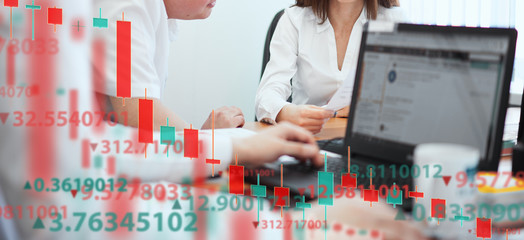 A group of people analyze the stock market. Business and finance, technology, cryptocurrency, stock...