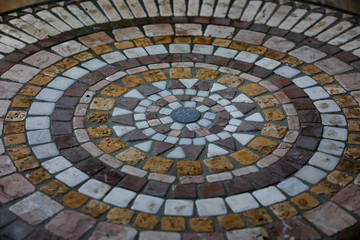 Muslim round stone ornament on the floor in the countryside