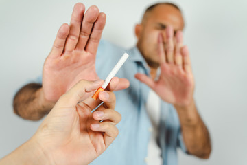 Man refusing a cigarettes. Concept Quitting smoking,World No Tobacco Day.