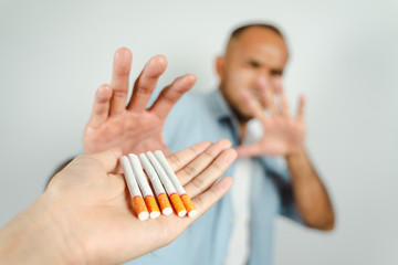 Man refusing a cigarettes. Concept Quitting smoking,World No Tobacco Day.