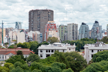 Fototapeta premium Cityscape of Buenos Aires with apartment buildings and trees
