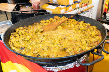Seafood indian dish cooked large pan wok, street food festival.