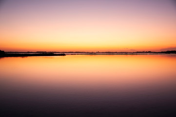 The sky merges into the salt pan at sunset in Formentera, Balearic Islands Spain. Excellent...