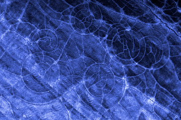 abstract blue background, closeup, spoiled and cracked surface of the old floor