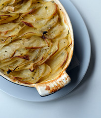 Classic homemade potato gratin served hot