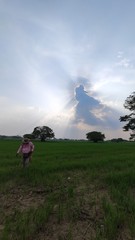 silhouette of a man walking on a hill