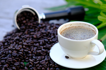 cup of coffee with beans