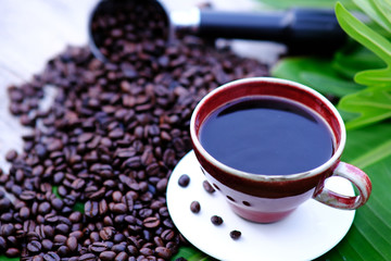 cup of coffee with beans