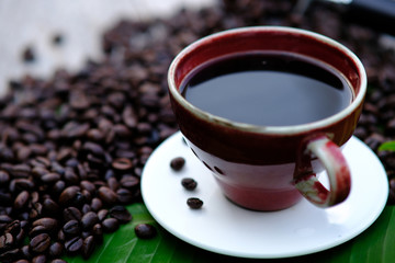cup of coffee with beans