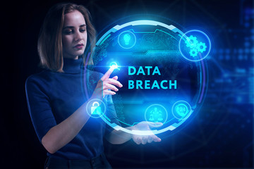 Business, Technology, Internet and network concept. Young businessman working on a virtual screen of the future and sees the inscription: Data breach
