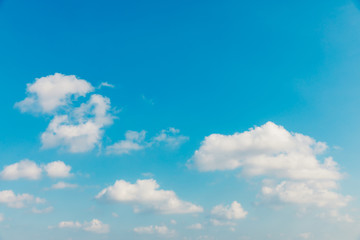 Clear blue sky and clouds background