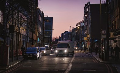 Fototapeta na wymiar london downtown by night skyscrapers traffic lights