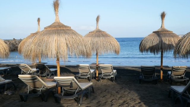 empty beaches with black sand beach, wild and power of the atlantic ocean wait tourists, Tenerife, Canary Islands, Spain, tourism problems after the coronavirus pandemic