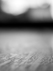 Black and white closeup of a wooden surface