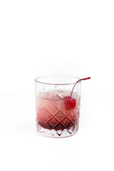 Old fashioned cocktail with cherry